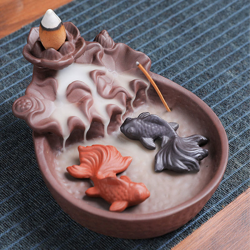Koi Fish Ox Purple Clay Incense Burner – mountain rock form with lotus, two koi in smoke, elevated view
