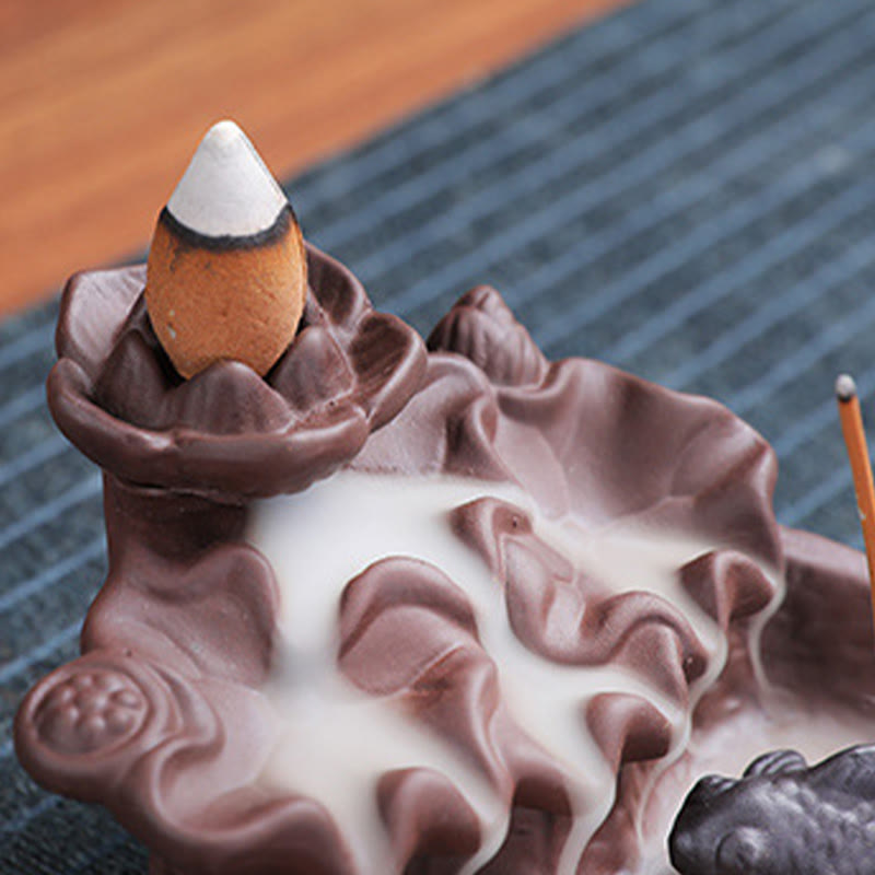 Koi Fish Ox Purple Clay Incense Burner – lotus leaf form, dark koi in dense smoke cascade, close-up, zen