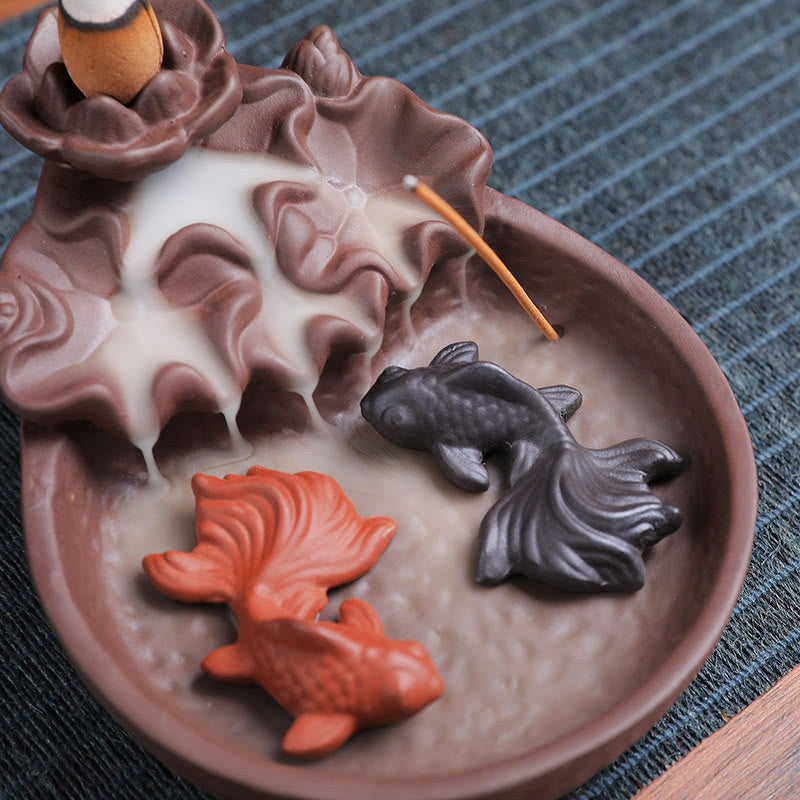 Koi Fish Ox Purple Clay Incense Burner – lotus leaf basin, yin-yang koi in thick smoke, overhead angle