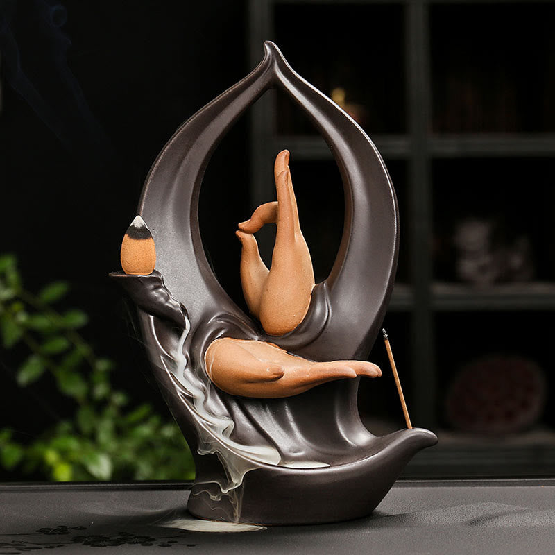Mountain Water Buddha Hand Incense Burner – Two-tone mudra hands in dark frame, cone and stick