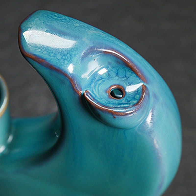 Crescent Moon Incense Burner – Close-up of teal crackle glaze vent hole and bronze edge detail, artisan