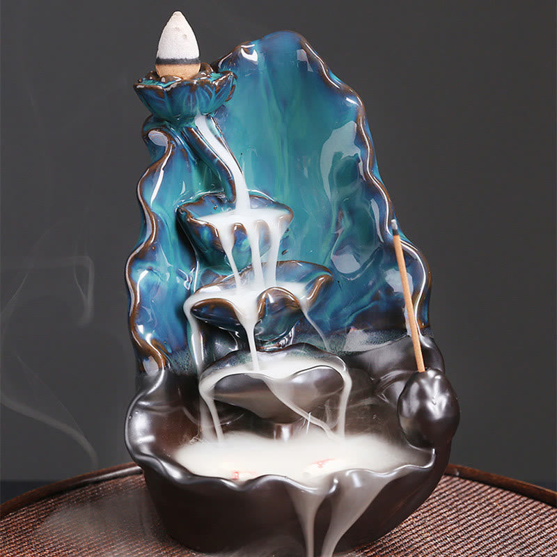 Ceramic Backflow Incense Burner – Dense smoke waterfall pooling in lotus base on woven mat, backflow incense