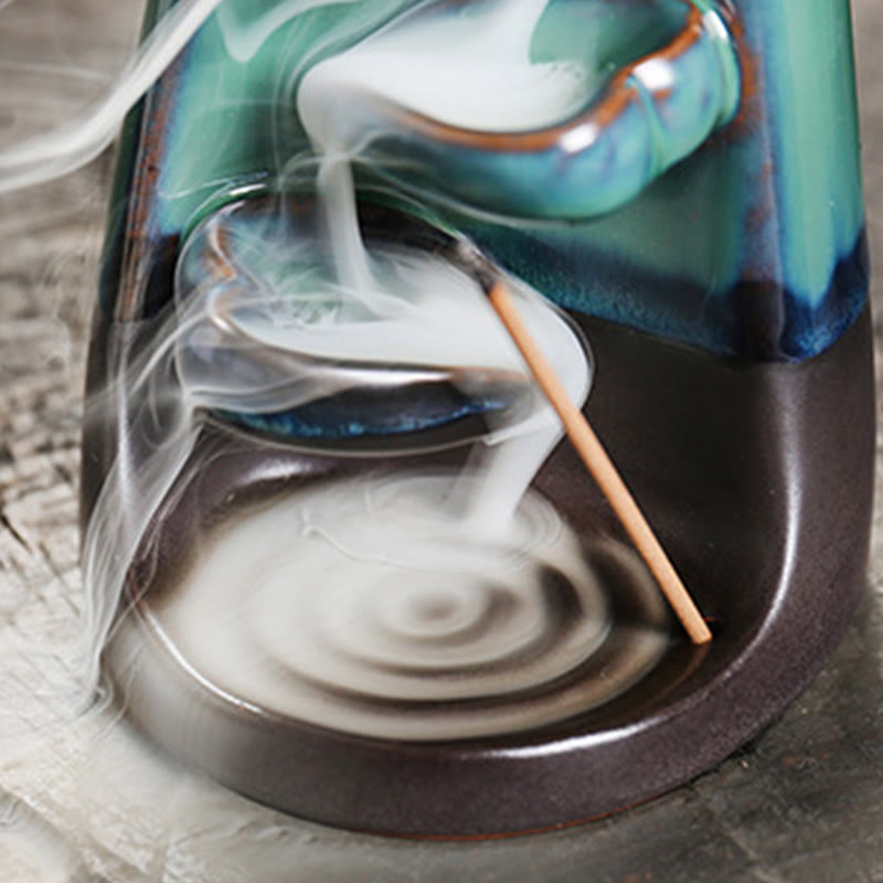 Ceramic Lovers Embrace Backflow Incense Burner - Macro smoke waterfall in teal basin, healing decor