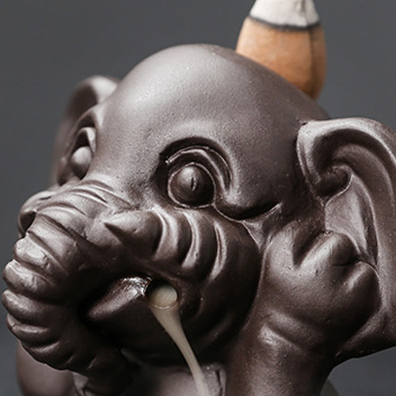 Cute Elephant Incense Burner – Frontal view, smoke cascade from trunk, dark chocolate ceramic