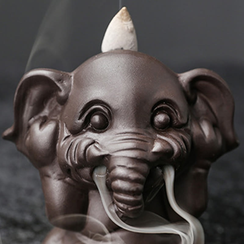 Cute Elephant Incense Burner – Rear view, lit cone on head, wisp of smoke, matte finish