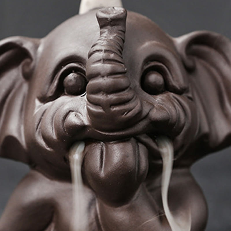 Cute Elephant Incense Burner – Smoke streams from mouth, pooling at base, matte ceramic