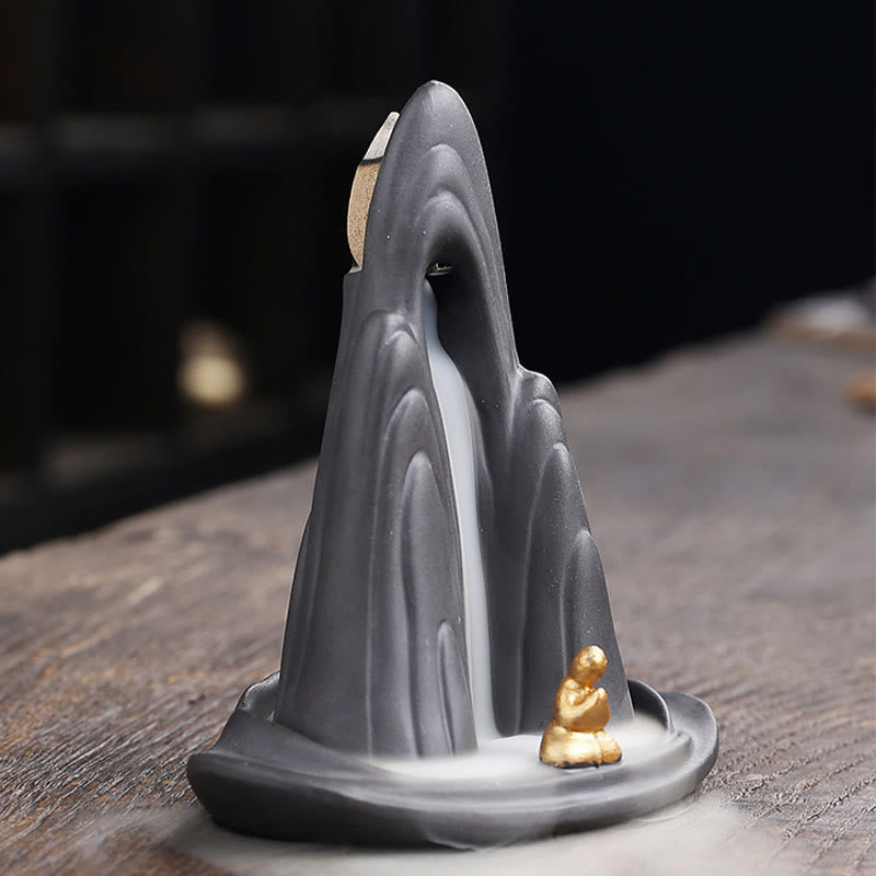 Little Monk Purple Clay Backflow Incense Burner - Tapered peak with gold figure and smoke stream, cone holder