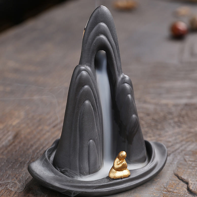 Little Monk Purple Clay Backflow Incense Burner - Dark mountain with gold monk and misty smoke, healing decor