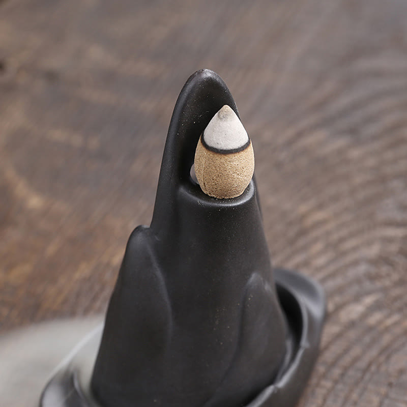 Little Monk Purple Clay Backflow Incense Burner - Close-up of incense cone on mountain peak, backflow cones