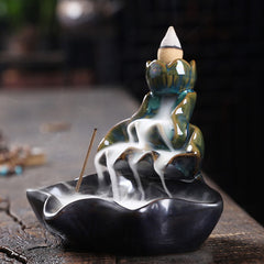 Lotus Leaf Koi Fish Incense Burner – blue-green lotus bud with incense stick on wood, meditation