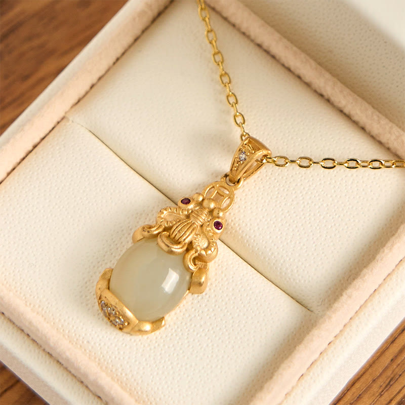 White Jade Pixiu Wealth Luck Pendant Necklace – white jade Pixiu pendant with gold setting in cream jewelry box, feng shui wealth necklace