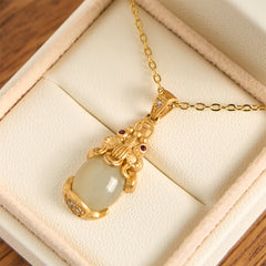 White Jade Pixiu Wealth Luck Pendant Necklace – white jade Pixiu pendant with gold setting in cream jewelry box, feng shui wealth necklace