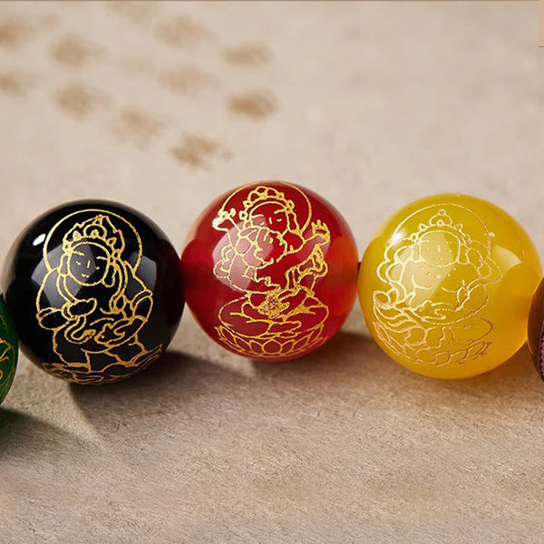 Five Directions Wealth Bracelet - Individual five-element beads with gold Bodhisattva engravings, gemstone detail shot