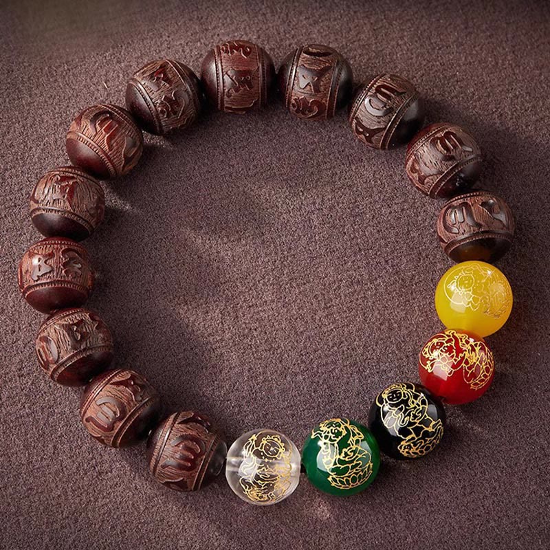 Five Directions Wealth Bracelet - Overhead view of wood bead bracelet with five-color guardian beads on linen backdrop