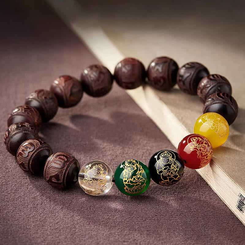 Five Directions Wealth Bracelet - Carved wood bracelet with five-direction beads on textured fabric, cultural accessory