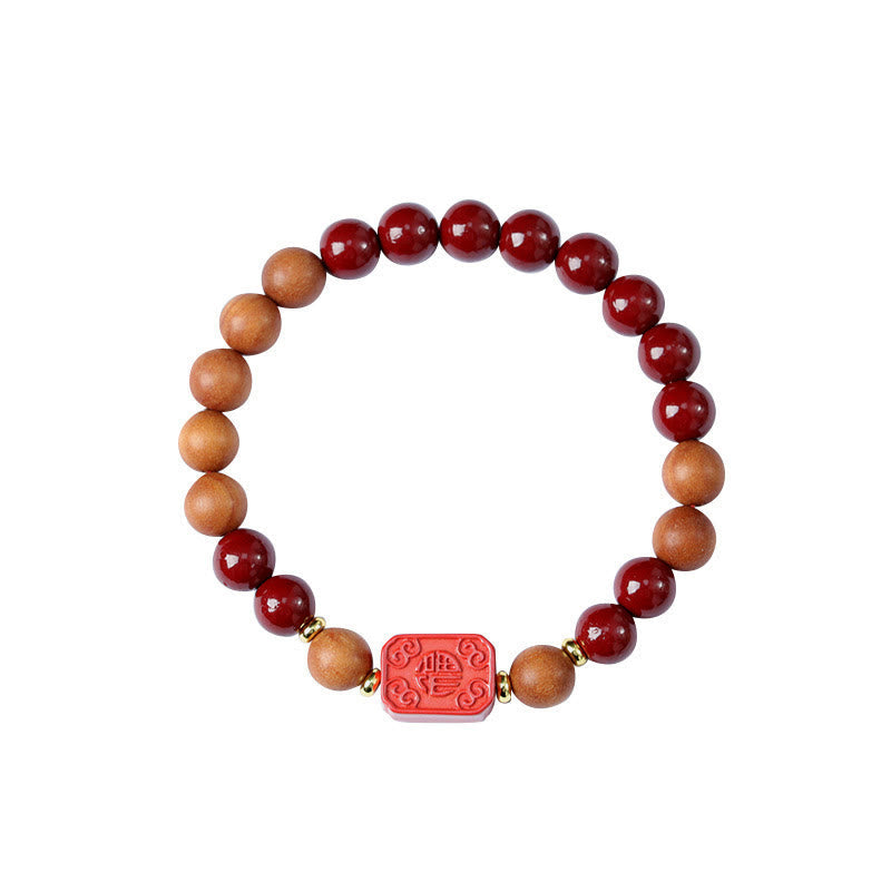 Cinnabar Wood Lotus Fu Bracelet - white bg, Fu fortune bead at bottom, protective