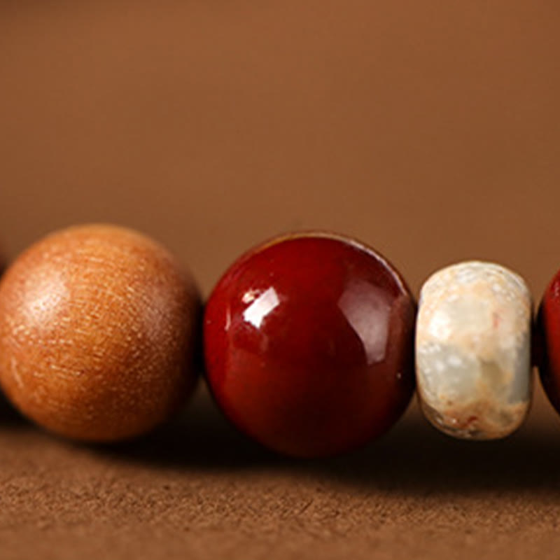 Cinnabar Wood Lotus Fu Bracelet - bead texture close-up, cinnabar and wood contrast, natural