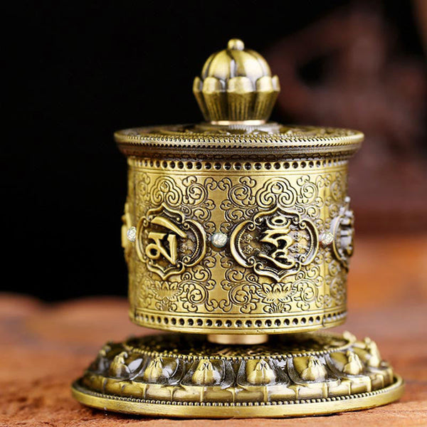 Lotus Prayer Wheel - Rotated view revealing Tibetan mantra panels on bronze cylinder, zen decor