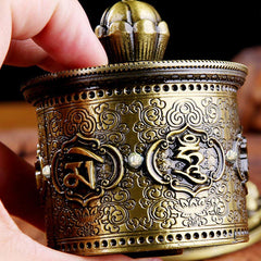 Lotus Prayer Wheel - Handheld brass wheel with Tibetan Om script, portable Buddhist practice