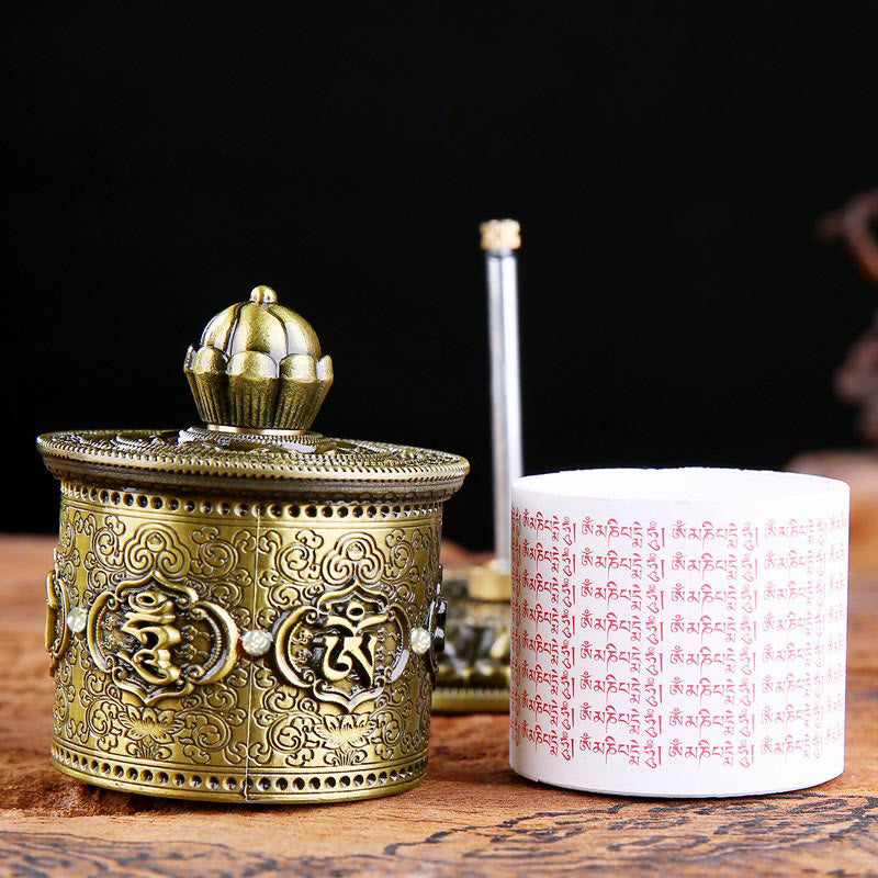 Lotus Prayer Wheel - Open cylinder revealing red Om Mani Padme Hum scroll inside, spiritual craft