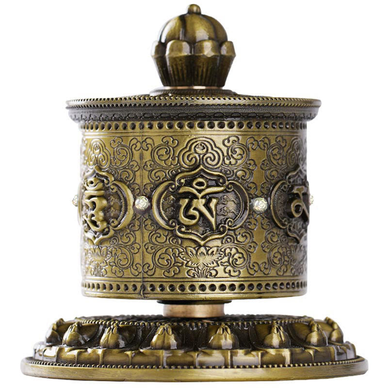 Lotus Prayer Wheel - Front view of embossed brass drum with Tibetan script, meditation accessory