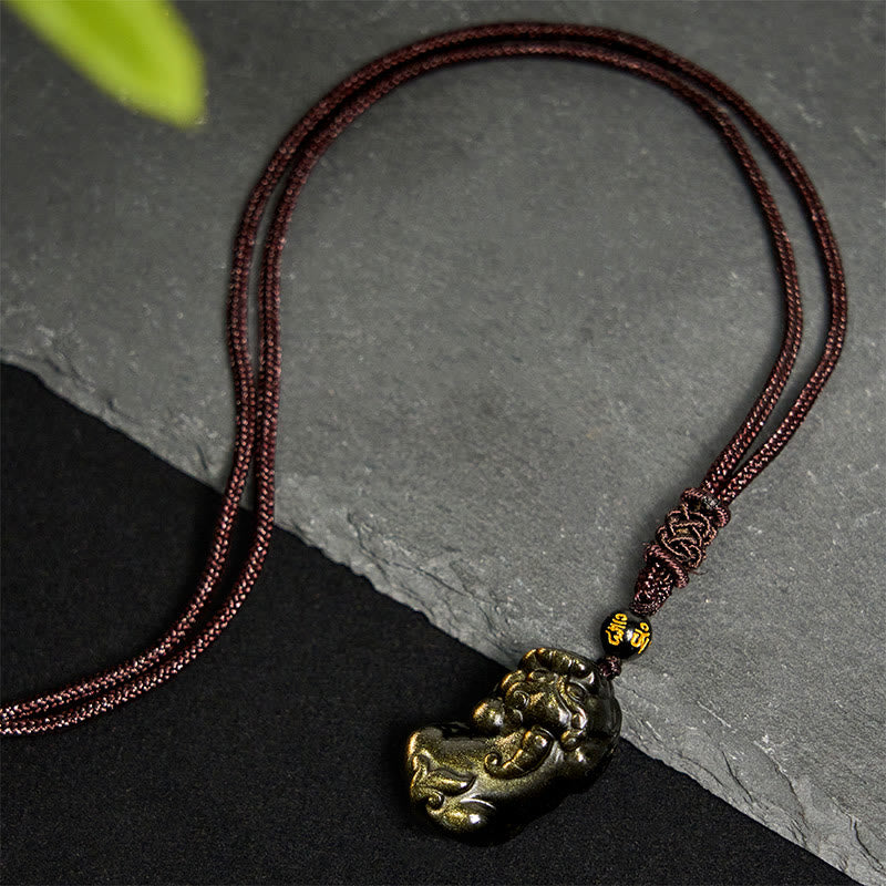Gold Sheen Obsidian PiXiu Wealth Rope Necklace Pendant – full maroon rope necklace on slate, wealth talisman pendant gift
