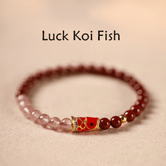 Cinnabar Strawberry Quartz Koi Fish Bracelet – red and pink beads with koi, low angle, blessing