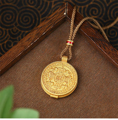 Om Mani Padme Hum Pendant – Reverse side with eight auspicious symbols in relief on dark wood, spiritual amulet