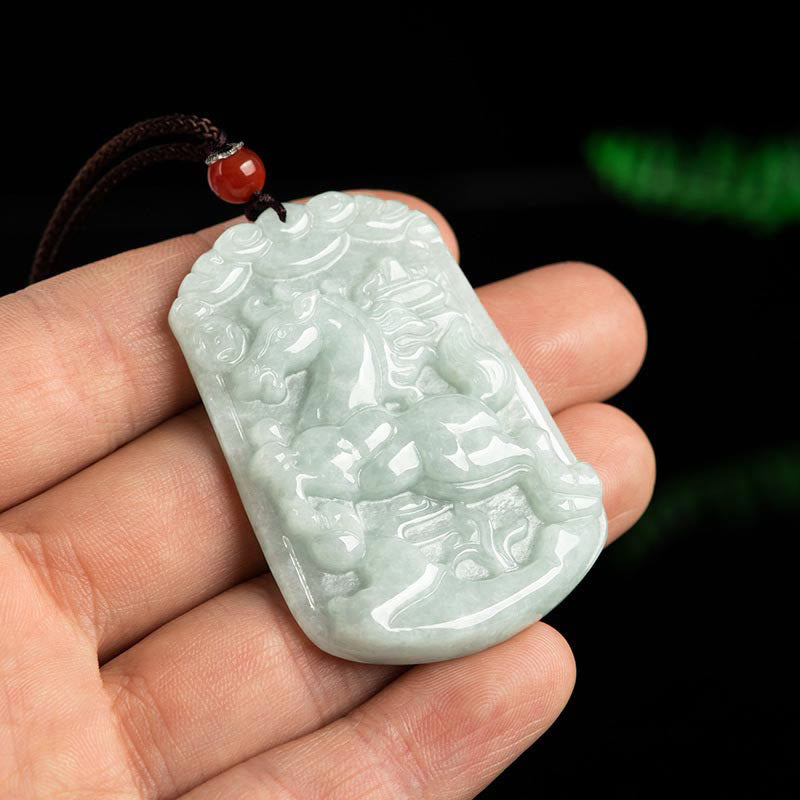Natural Jade Zodiac Amulet Pendant – Hand-held horse jade pendant scale reference on black background, Authentic