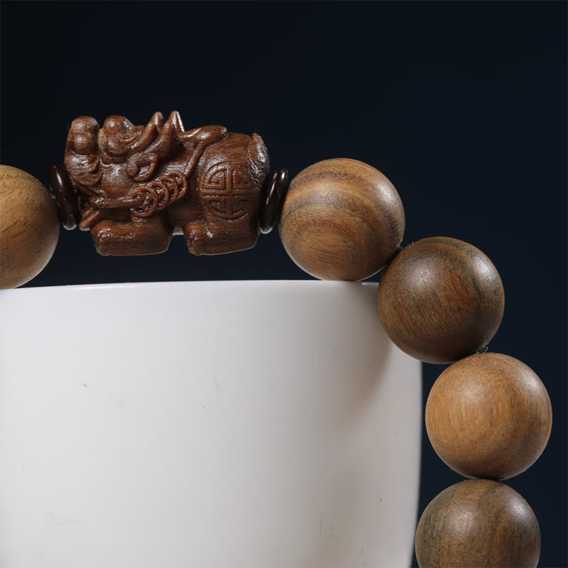 Green Sandalwood Pixiu Attract Wealth Bracelet – side angle navy white stand lion, Handcrafted