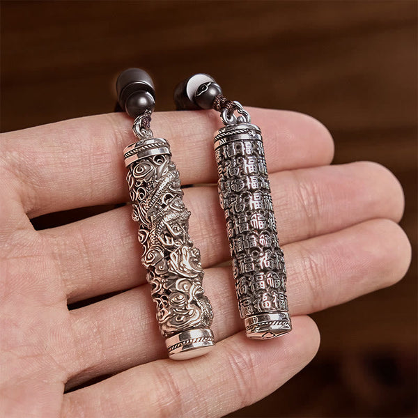 Copper Dragon Fu Character Pendant – dragon and Fu pendants held in open palm, Blessing