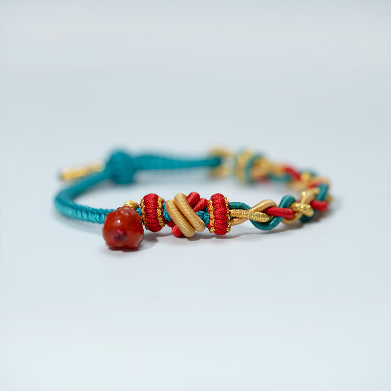 Natural Red Agate PiXiu Braided Bracelet – side close-up of knots and PiXiu, red agate feng shui charm