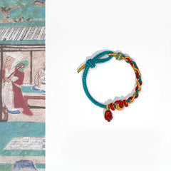 Natural Red Agate PiXiu Braided Bracelet – top view with traditional art side, four-strand wealth bracelet