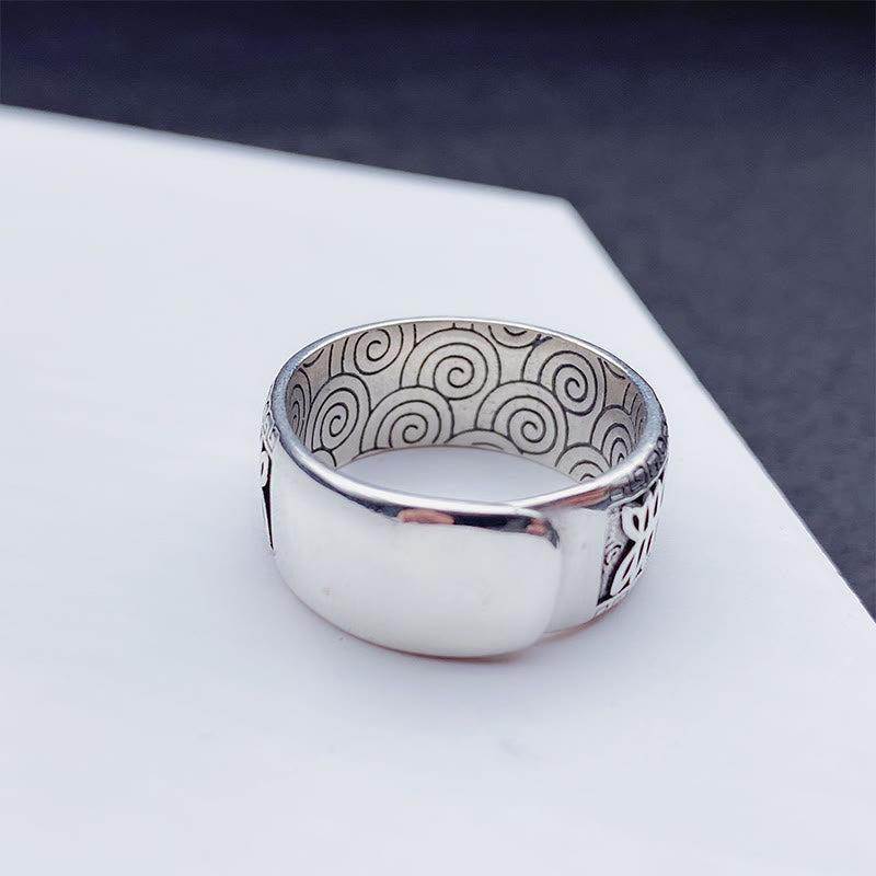 Om Mani Padme Hum Copper Ring – Low angle highlighting intricate inner cloud engravings on polished copper band