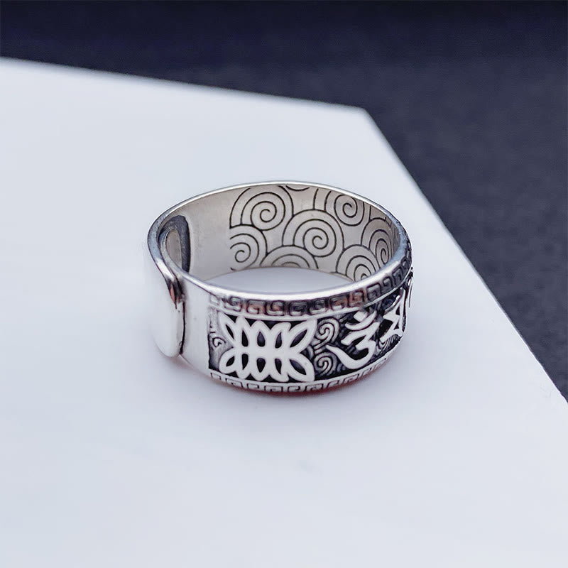 Om Mani Padme Hum Copper Ring – Open adjustable cuff displaying Om symbol and lotus carving, antique silver spiritual ring