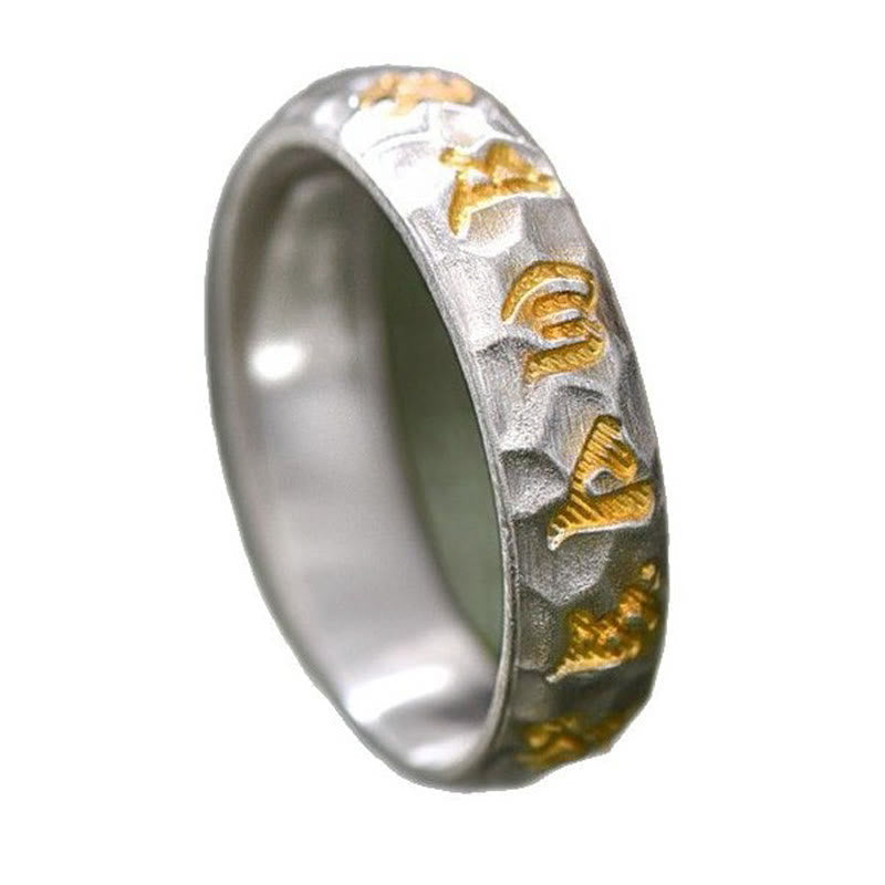 999 Silver Hammered Om Ring – White background studio shot of gold characters on textured silver band