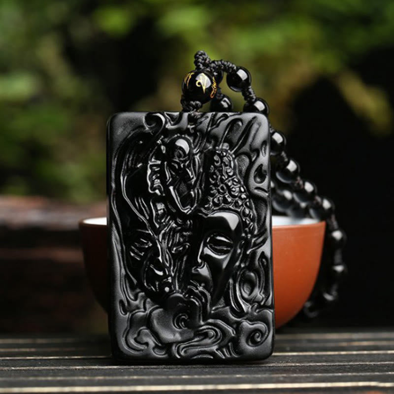 Black Obsidian Buddha Devil Necklace – glossy black stone surface, volcanic glass texture