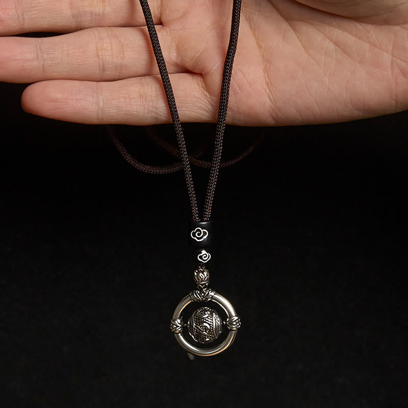 Om Mani Padme Hum Pendant – Held in hand on black background showing actual size and bead details, prayer wheel necklace