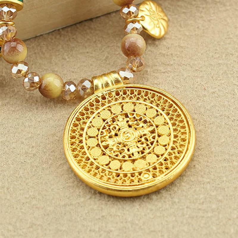 Tiger Eye Mandala Pendant – circular filigree with crystal on bead chain, strength