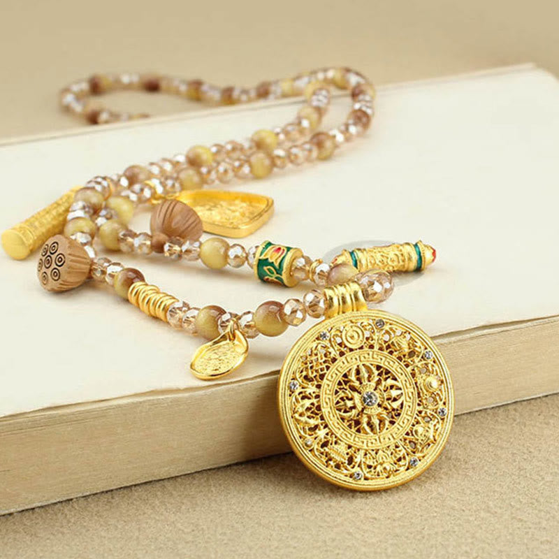 Tibetan Tiger Eye Necklace – gold mandala pendant on beaded strand, courage necklace
