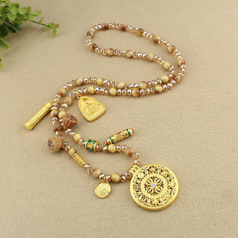 Tibetan Tiger Eye Necklace – full S-curve on linen with eucalyptus, courage beads