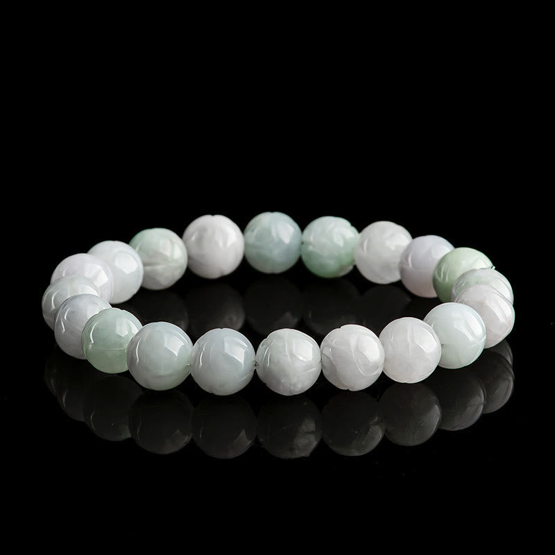 Jade Prosperity Bracelet – carved lotus beads in oval on black, natural jade
