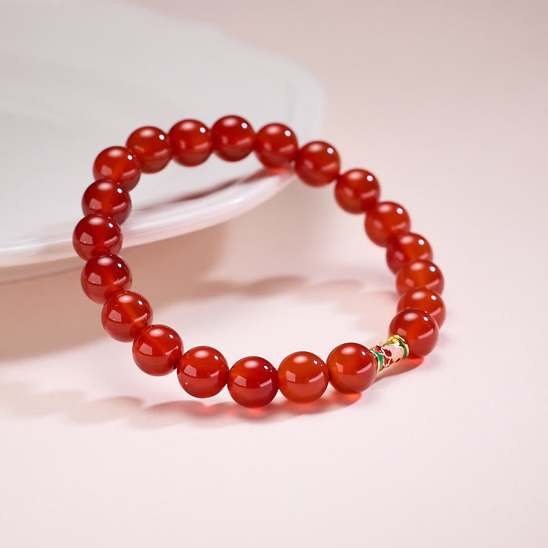 Natural Red Agate Koi Fish Bracelet – red agate with koi bead, three-quarter low angle