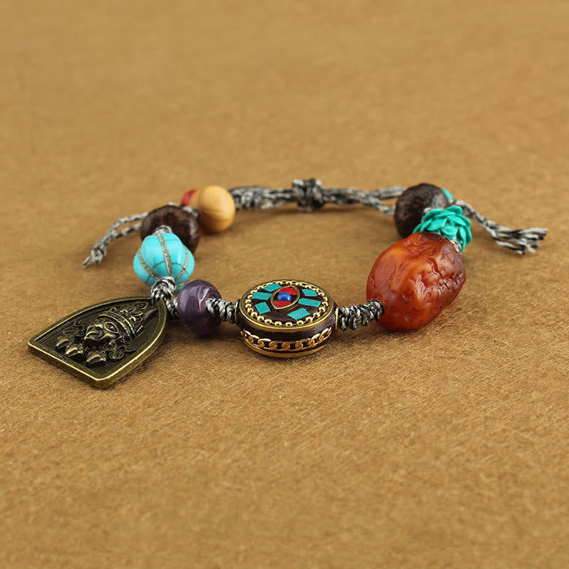 Tibetan Zakiram Turquoise Lotus Rope Bracelet – three-quarter view with mandala inlay bead and shield pendant, Spiritual