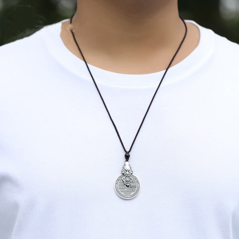 Mountain Ghost Bagua Copper Pixiu Necklace – man wearing white shirt black cord pendant, unisex protection necklace