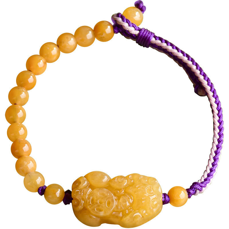 Golden Silk Jade PiXiu Wealth Bracelet – clean white background full view, purple cord wealth bracelet