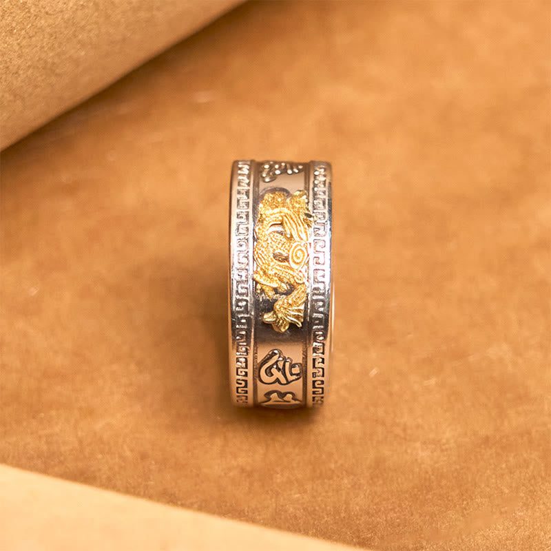 Dragon Heart Sutra Copper Strength Ring – top-down view wide band gold dragon on tan, Artisan