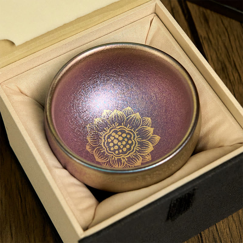 Jianzhan Lotus Tea Cup – iridescent purple glaze with gold lotus in satin-lined gift box, ceramic teaware
