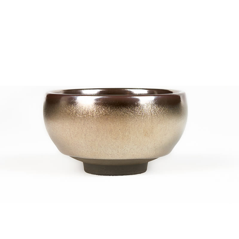 Jianzhan Koi Fish Lotus Teacup – eye-level side profile, bronze-to-gold gradient glaze, textured surface, white background