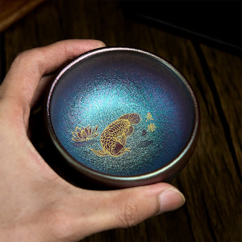 Jianzhan Koi Fish Lotus Teacup – side angle with iridescent bronze-gold gradient, traditional bowl shape, white background